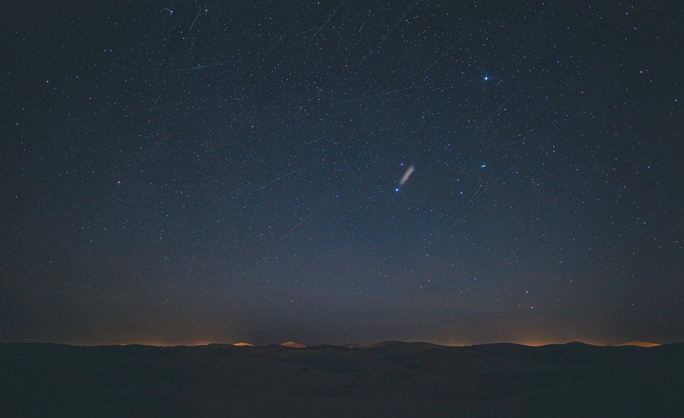 A night sky of fine stars above the dunes